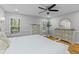 A calming main bedroom with hardwood floors, ceiling fan, and soft natural light at 715 Majestic Oak Dr, Charleston, SC 29412