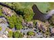 Overhead view of a home situated by a verdant golf course and winding creek at 732 Spinnaker Beachhouse, Seabrook Island, SC 29455