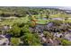 Picturesque aerial view of a home nestled near a golf course and serene water feature at 732 Spinnaker Beachhouse, Seabrook Island, SC 29455