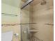 Modern bathroom featuring a glass-enclosed shower with tile surround and a built-in bench, offering a spa-like experience at 732 Spinnaker Beachhouse, Seabrook Island, SC 29455