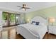 Bedroom featuring access to a private balcony, neutral decor, and lots of light at 732 Spinnaker Beachhouse, Seabrook Island, SC 29455