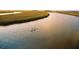This image shows a couple kayaking on a river that adjoins this community at 732 Spinnaker Beachhouse, Seabrook Island, SC 29455