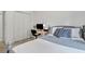 Cozy bedroom with a gray bed, desk setup, and a white closet at 853 Bibury Ct, Charleston, SC 29414