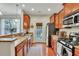 Lovely kitchen with stainless steel appliances, granite counters, and access to the backyard at 853 Bibury Ct, Charleston, SC 29414