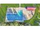 Aerial view of a community pool, complete with lounge chairs, pool house and picnic area at 853 Bibury Ct, Charleston, SC 29414