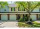 Inviting townhome featuring a well-manicured front yard and welcoming entryway at 8652 Grassy Oak Trl, North Charleston, SC 29420