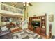 Spacious living room featuring a vaulted ceiling, and entertainment center for relaxation at 8652 Grassy Oak Trl, North Charleston, SC 29420
