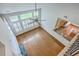 A bird's eye view looking down on a hardwood floor, with an attached kitchen and high ceilings at 9379 Harroway Rd, Summerville, SC 29485