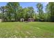 Spacious backyard featuring two storage sheds at 1019 Levi Lake Rd, Johns Island, SC 29455