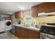 Bright kitchen with plenty of counter space, modern appliances, and laundry area at 1019 Levi Lake Rd, Johns Island, SC 29455