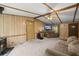Inviting living room features a ceiling fan, plush seating, and wood-burning stove at 1019 Levi Lake Rd, Johns Island, SC 29455