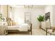 Inviting main bedroom with a large bed, accent pillows, a wooden dresser, and a cozy atmosphere at 1022 Sagegrass St, Summerville, SC 29485
