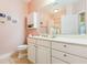 Inviting bathroom with a wide vanity, a large mirror, and ample cabinet space at 1025 Riverland Woods Pl # 1008, Charleston, SC 29412