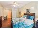 Bedroom with wood floors, lots of storage, and a desk area at 1025 Riverland Woods Pl # 1008, Charleston, SC 29412