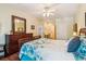 Bedroom with hardwood flooring, light yellow walls, and a dark wood dresser at 1025 Riverland Woods Pl # 1008, Charleston, SC 29412