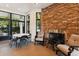 Outdoor fireplace with stone accent wall and comfortable seating, perfect for gatherings at 1025 Riverland Woods Pl # 1008, Charleston, SC 29412