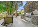 Outdoor kitchen with stone-clad grill, providing a perfect space for outdoor cooking and entertaining at 1025 Riverland Woods Pl # 1008, Charleston, SC 29412