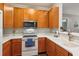 Charming kitchen features white countertops, stainless steel appliances and light wood cabinetry at 1025 Riverland Woods Pl # 1008, Charleston, SC 29412