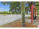 Relaxing swing set overlooking a serene lake with a fountain, perfect for enjoying the outdoors at 1025 Riverland Woods Pl # 1008, Charleston, SC 29412