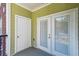 Patio with double door access to the home's exterior at 1025 Riverland Woods Pl # 1008, Charleston, SC 29412