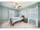 Calming bedroom featuring a comfortable bed, natural light, and minimalist decor at 103 Radtko Rd, Summerville, SC 29486