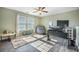Inviting home office space featuring a large window with natural light and a modern standing desk setup at 103 Radtko Rd, Summerville, SC 29486