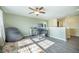 Cozy home office with an oversized beanbag chair, a standing desk, and stylish neutral decor at 103 Radtko Rd, Summerville, SC 29486