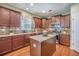 Bright kitchen with stainless appliances, granite counters, and an island perfect for cooking at 103 Radtko Rd, Summerville, SC 29486