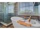 Luxurious bathroom showcasing a standalone tub and a separate glass shower at 1034 Sterling Ln, Summerville, SC 29483