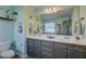 Bathroom featuring double sinks, a large mirror, and modern fixtures at 1034 Sterling Ln, Summerville, SC 29483