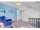 Bright bedroom featuring a crib, chair, and closet at 1034 Sterling Ln, Summerville, SC 29483