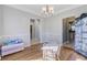 Spacious dining area with hardwood floors, neutral paint, and a view into other rooms, perfect for entertaining at 1034 Sterling Ln, Summerville, SC 29483