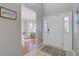 Elegant foyer with neutral tones, a tiled floor, and a view into the adjacent dining area, creating a welcoming entrance at 1034 Sterling Ln, Summerville, SC 29483