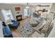 Spacious living room with fireplace open to dining area and kitchen at 1034 Sterling Ln, Summerville, SC 29483
