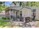 Charming patio area with outdoor seating, perfect for entertaining and enjoying the serene backyard at 104 Valentin Dr, Summerville, SC 29483