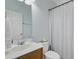 Bathroom showcasing a single sink vanity, toilet, and white shower curtain at 104 Valentin Dr, Summerville, SC 29483
