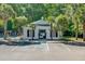Inviting community pool area with pool house, palm trees, and accessible parking at 104 Valentin Dr, Summerville, SC 29483