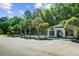 Community pool with ample parking, lounge chairs, and landscaping providing a resort-like experience at 104 Valentin Dr, Summerville, SC 29483