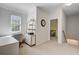 Upstairs hallway providing access to multiple rooms, including an office nook with a desk at 104 Valentin Dr, Summerville, SC 29483