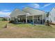 Backyard featuring patio seating, a pergola, a grill, and green space at 108 Bluff Isle Ct, Summerville, SC 29486