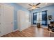 Blue bedroom features a hidden murphy bed and stylish decor at 108 Bluff Isle Ct, Summerville, SC 29486