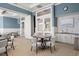 Well-lit common room with tables, chairs, a kitchenette, and ample seating at 108 Bluff Isle Ct, Summerville, SC 29486