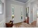 Bright foyer with hardwood floors, white trim, and lots of natural light at 108 Bluff Isle Ct, Summerville, SC 29486