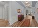 Inviting hallway features hardwood floors and custom decor at 108 Bluff Isle Ct, Summerville, SC 29486