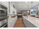 Large kitchen with white countertops and view to a bar area at 108 Bluff Isle Ct, Summerville, SC 29486