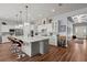 Spacious kitchen with a large island, modern lighting, and stainless steel appliances at 108 Bluff Isle Ct, Summerville, SC 29486