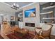 Comfortable living room features fireplace, shelving, recessed lighting and cozy chairs at 108 Bluff Isle Ct, Summerville, SC 29486