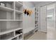 Mudroom with built-in shelving, bench, and sliding barn door at 108 Bluff Isle Ct, Summerville, SC 29486