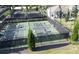 Aerial view of residents playing on community pickleball courts on a sunny day at 108 Bluff Isle Ct, Summerville, SC 29486