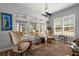 Sitting area offering scenic views, natural light, comfortable seating and an area rug at 108 Bluff Isle Ct, Summerville, SC 29486
